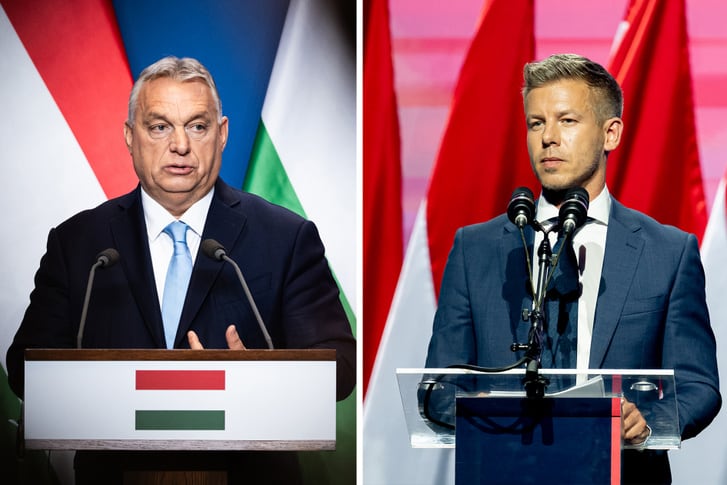 Bandera de Hungría ondeando frente al edificio del Parlamento en Budapest